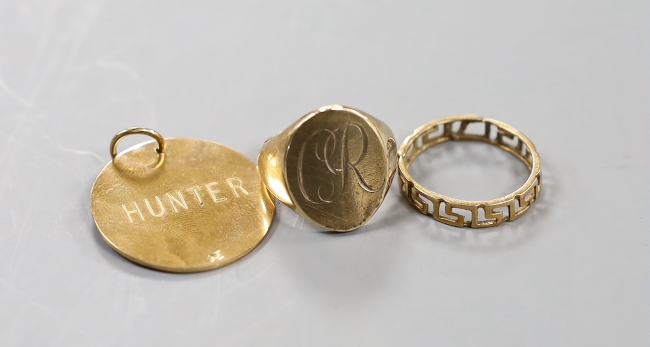 A 9ct gold signet ring, a yellow metal Greek Key band and a 9ct name pendant, 13.9 grams.